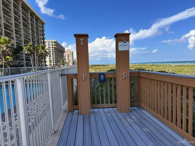 2700 Gulf Boulevard, Unit 204 South Padre Island, TX 78597 - Photo 28 of 31 a view of a balcony with wooden floor