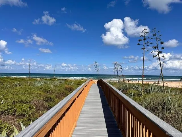 a view of swimming pool from a balcony