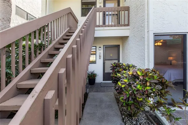 a view of front door and stairs