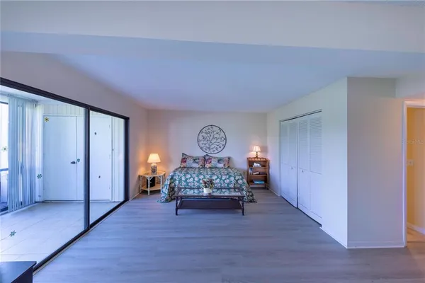 a room with furniture and a wooden floor