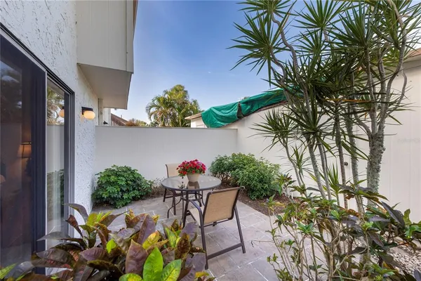 a view of an outdoor sitting area with golf course
