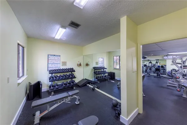 a view of a room with gym equipment