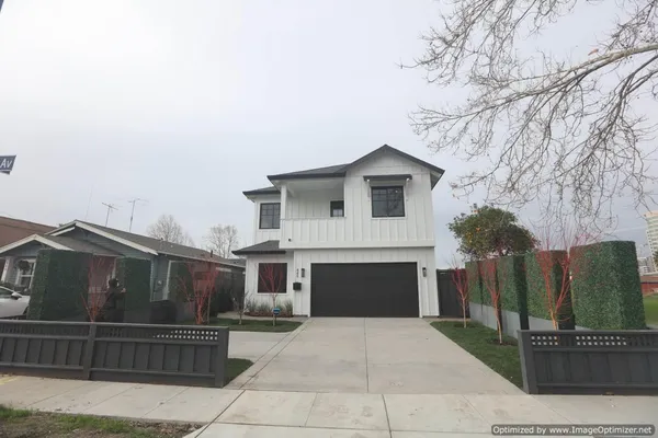 a front view of house with garage