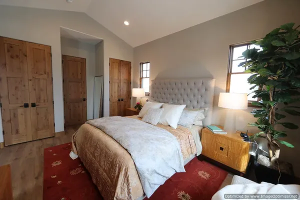 a view of a house with backyard sitting area and garden
