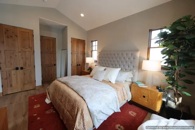 a view of a house with backyard sitting area and garden