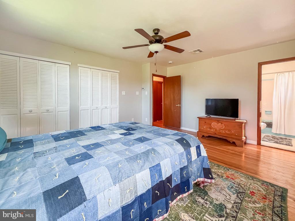 4643 Lerch Road Bensalem, PA 19020 - Photo 20 of 69 a bedroom with a bed and a flat screen tv