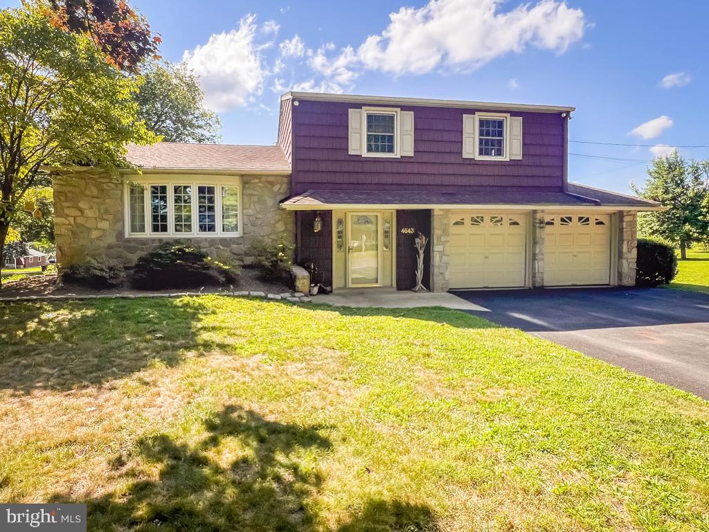 4643 Lerch Road Bensalem, PA 19020 - Photo 2 of 69 a view of a yard with a house