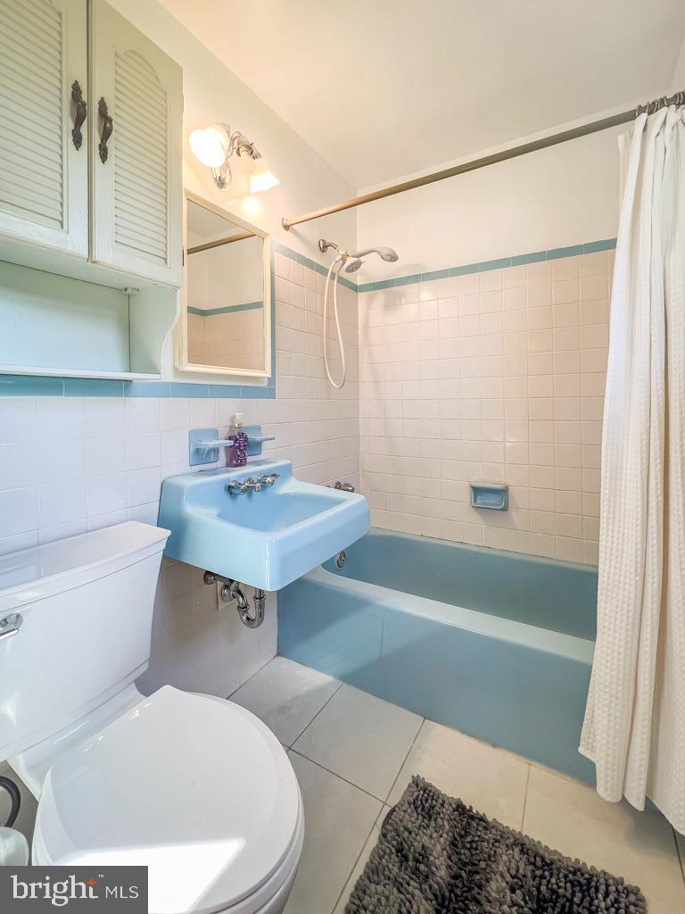 4643 Lerch Road Bensalem, PA 19020 - Photo 24 of 69 a bathroom with a sink toilet and shower