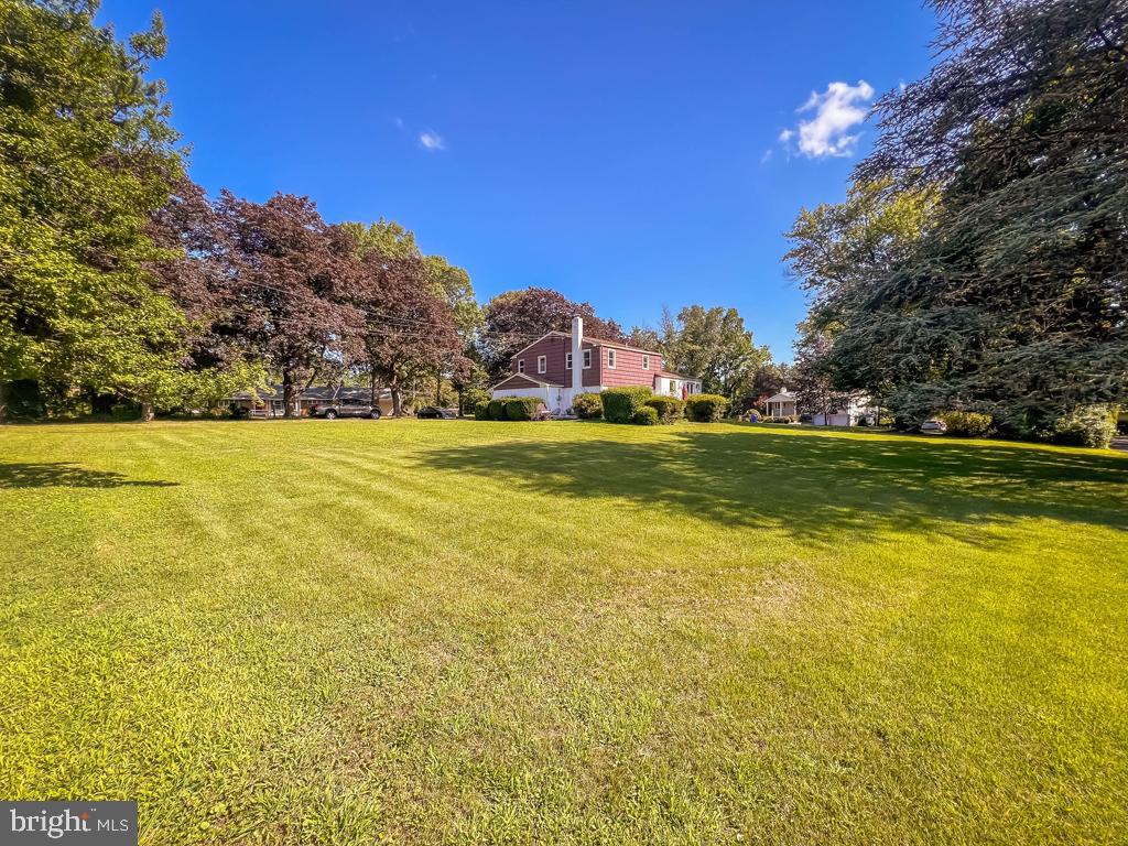 4643 Lerch Road Bensalem, PA 19020 - Photo 37 of 69 a view of a swimming pool with an outdoor space and seating area