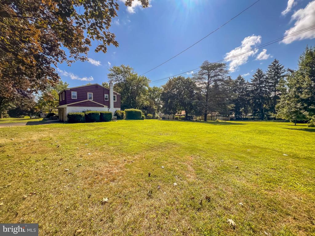 4643 Lerch Road Bensalem, PA 19020 - Photo 40 of 69 a view of a swimming pool with an outdoor space and seating area