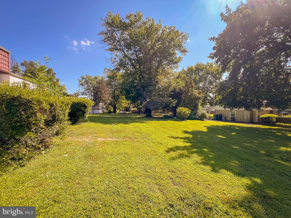 4643 Lerch Road Bensalem, PA 19020 - Photo 43 of 69 a swimming pool view with a fountain in the background