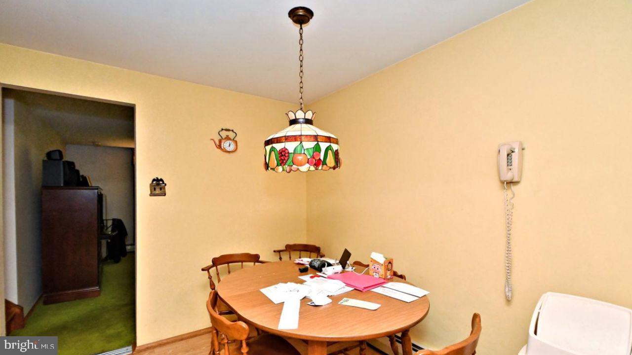 4643 Lerch Road Bensalem, PA 19020 - Photo 55 of 69 a view of a dining room with furniture and wooden floor