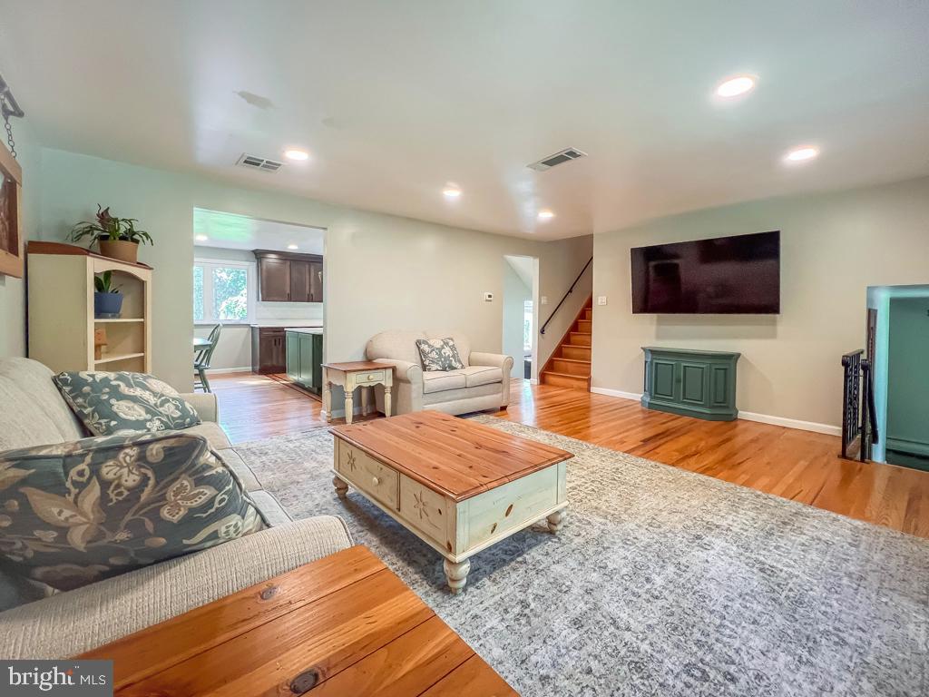 4643 Lerch Road Bensalem, PA 19020 - Photo 6 of 69 a living room with fireplace furniture and a flat screen tv