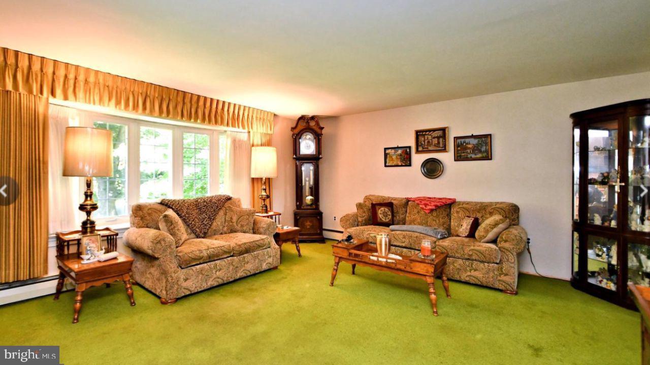 4643 Lerch Road Bensalem, PA 19020 - Photo 61 of 69 a living room with furniture and a large window