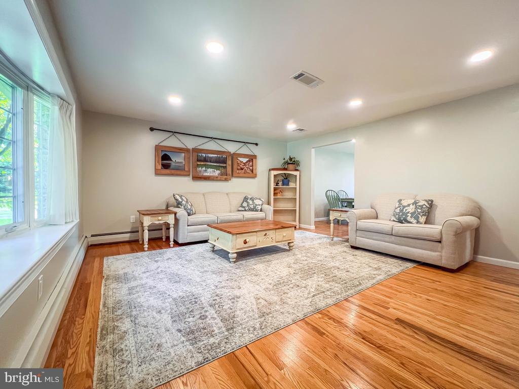 4643 Lerch Road Bensalem, PA 19020 - Photo 63 of 69 a living room with furniture and a wooden floor