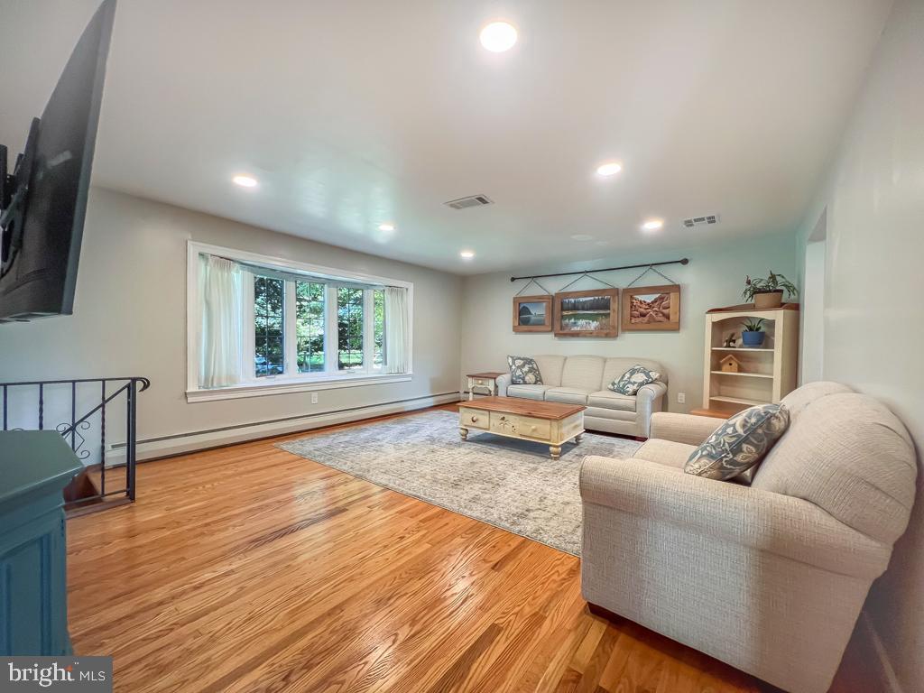 4643 Lerch Road Bensalem, PA 19020 - Photo 8 of 69 a living room with furniture and a wooden floor