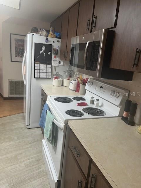 9030 Hernando Way Weeki Wachee, FL 34613 - Photo 19 of 40 a utility room with dryer and washer