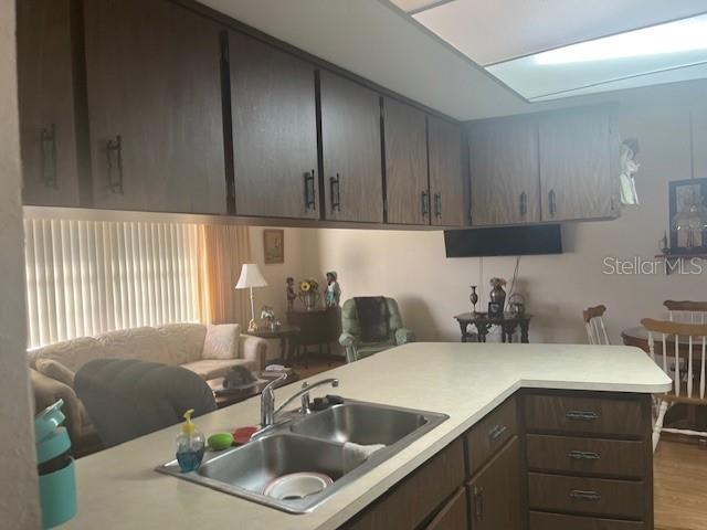 9030 Hernando Way Weeki Wachee, FL 34613 - Photo 20 of 40 a kitchen with a sink cabinets and window