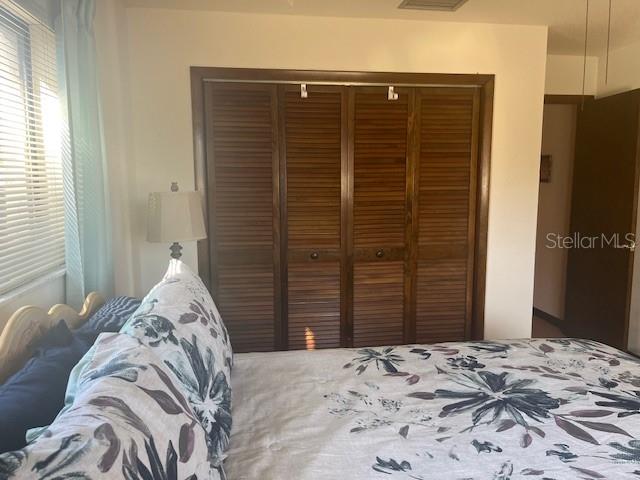 9030 Hernando Way Weeki Wachee, FL 34613 - Photo 28 of 40 a view of a bedroom