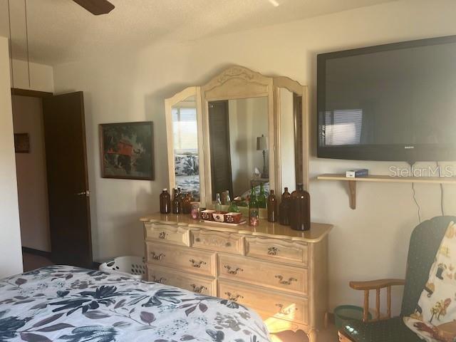 9030 Hernando Way Weeki Wachee, FL 34613 - Photo 29 of 40 a bathroom with a sink and a mirror