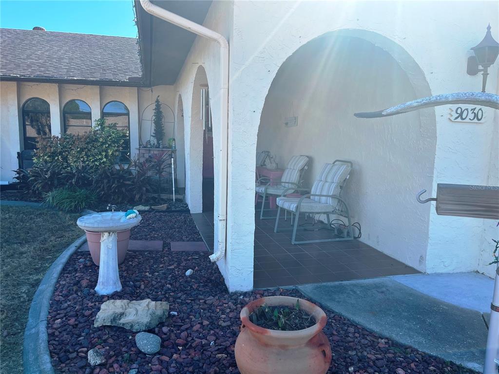 9030 Hernando Way Weeki Wachee, FL 34613 - Photo 3 of 40 a room with furniture and a potted plant