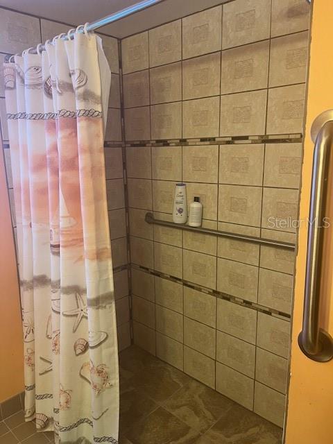 9030 Hernando Way Weeki Wachee, FL 34613 - Photo 31 of 40 a bathroom with a shower