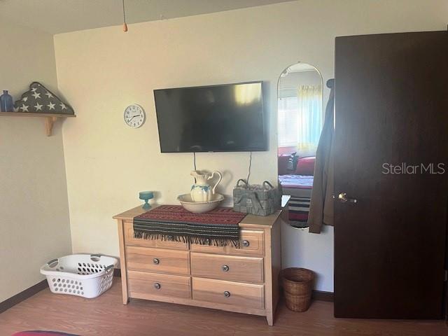 9030 Hernando Way Weeki Wachee, FL 34613 - Photo 33 of 40 a living room with furniture and a flat screen tv