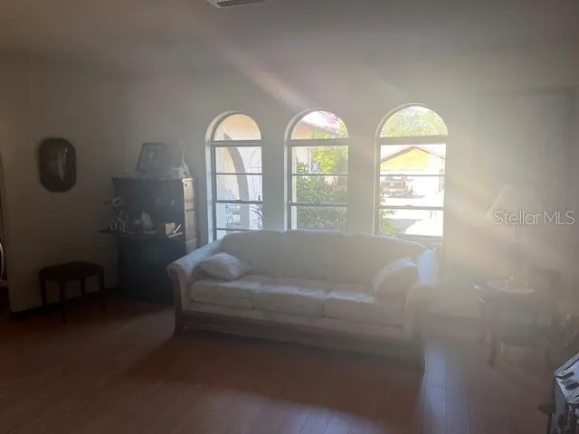 a bed room with two beds and a window