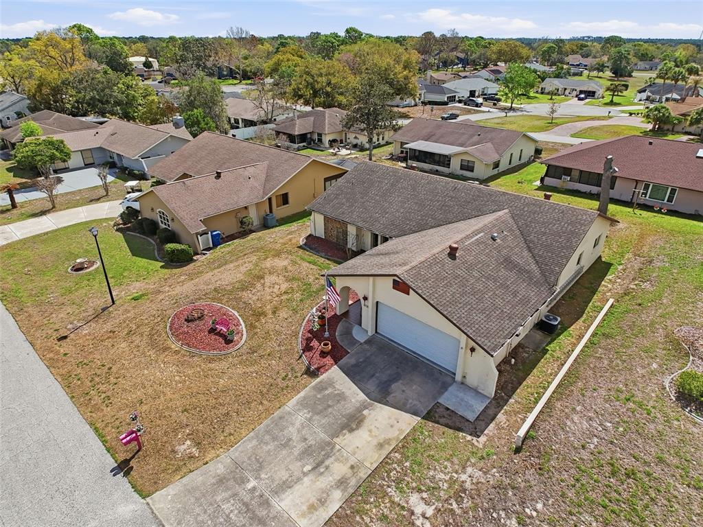 9030 Hernando Way Weeki Wachee, FL 34613 - Photo 63 of 67 an aerial view of a house with garden