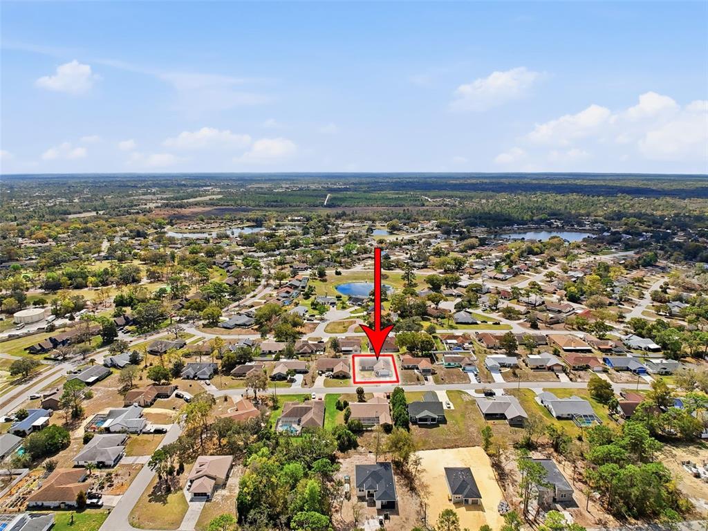 9030 Hernando Way Weeki Wachee, FL 34613 - Photo 66 of 67 an aerial view of multiple house