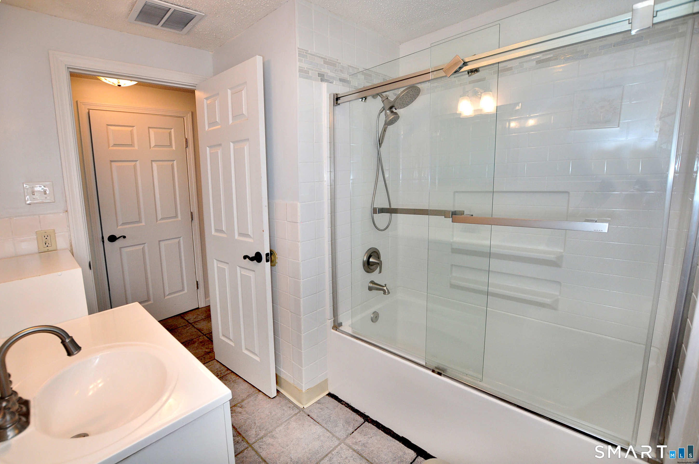 234 South Elm Street Windsor Locks, CT 06096 - Photo 16 of 33 a bathroom with a shower and a sink