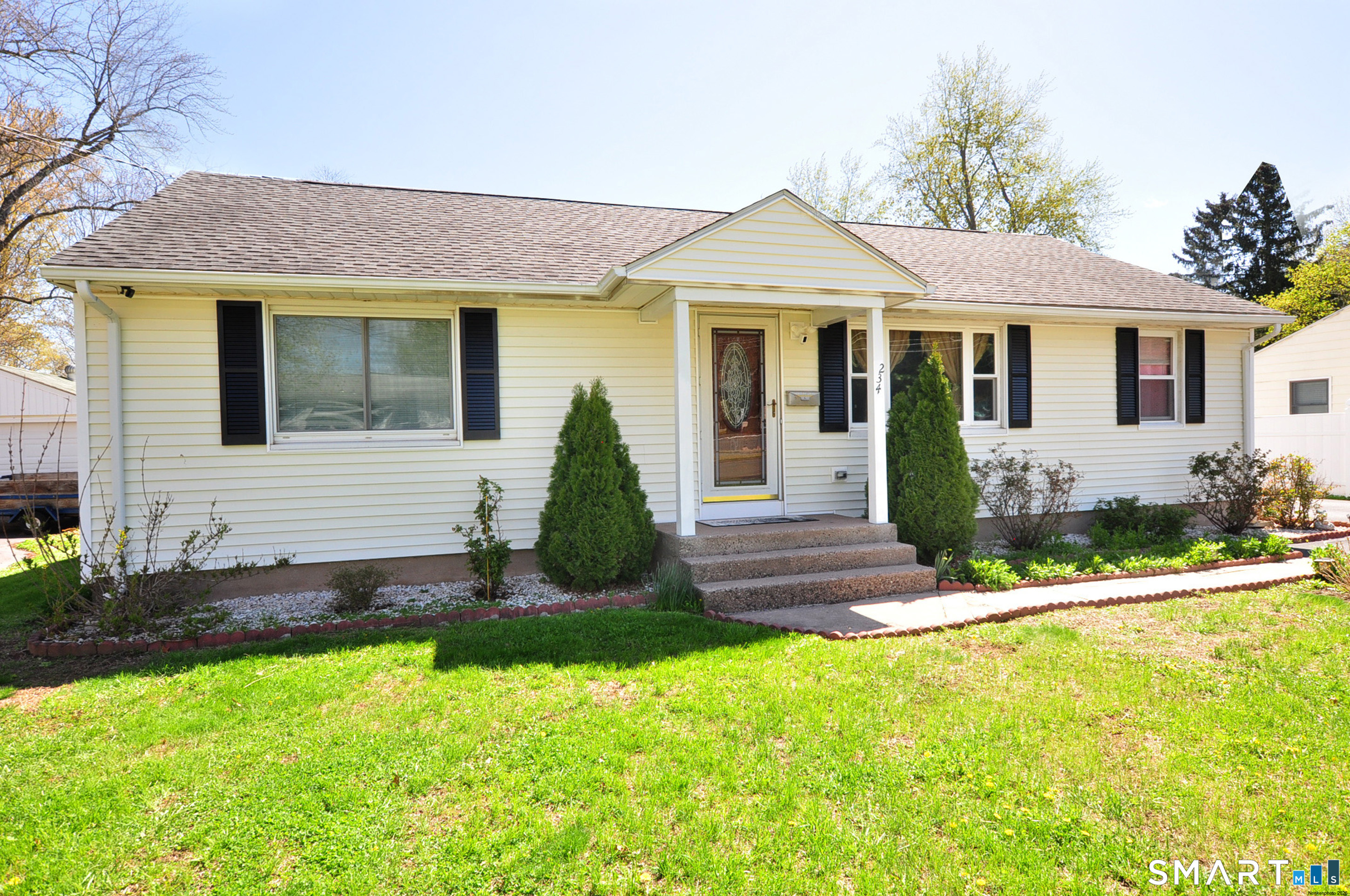 234 South Elm Street Windsor Locks, CT 06096 - Photo 2 of 33 a front view of a house with a yard