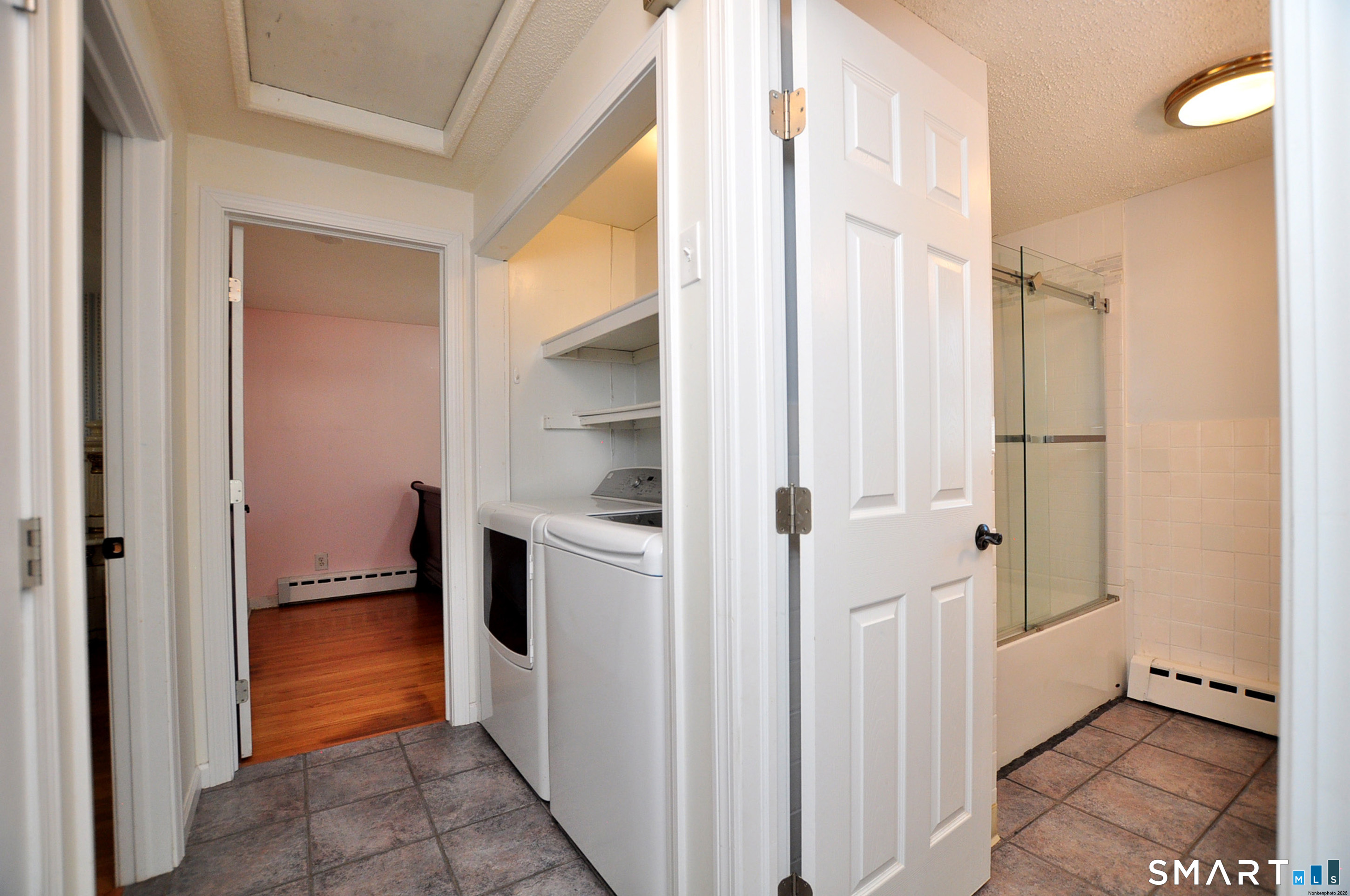 234 South Elm Street Windsor Locks, CT 06096 - Photo 21 of 33 a bathroom with a bathtub and a shower