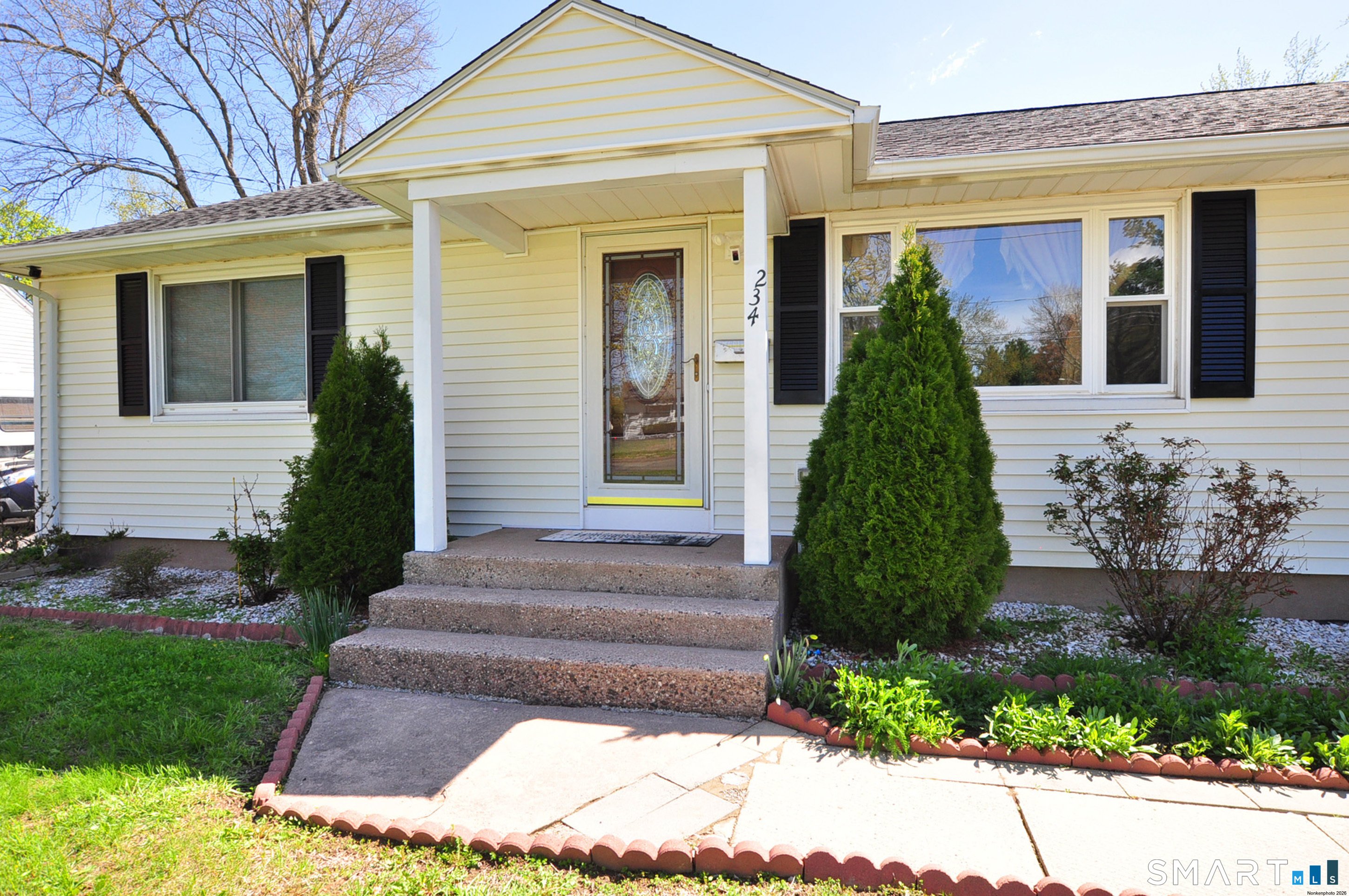 234 South Elm Street Windsor Locks, CT 06096 - Photo 3 of 33 a front view of a house with a yard