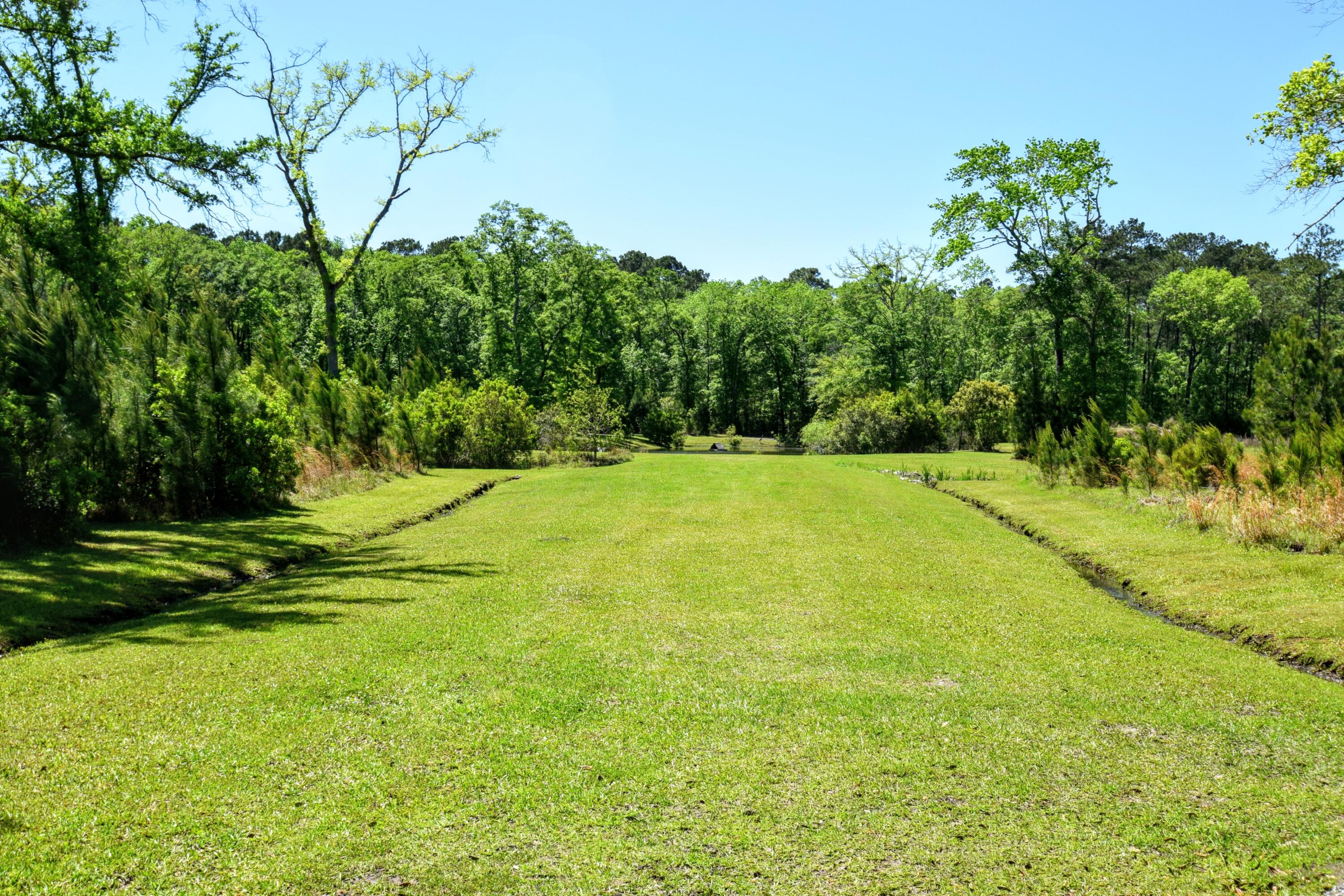 6870 Early Jersey Road Meggett, SC 29449 - Photo 10 of 37 Entrance to Pond