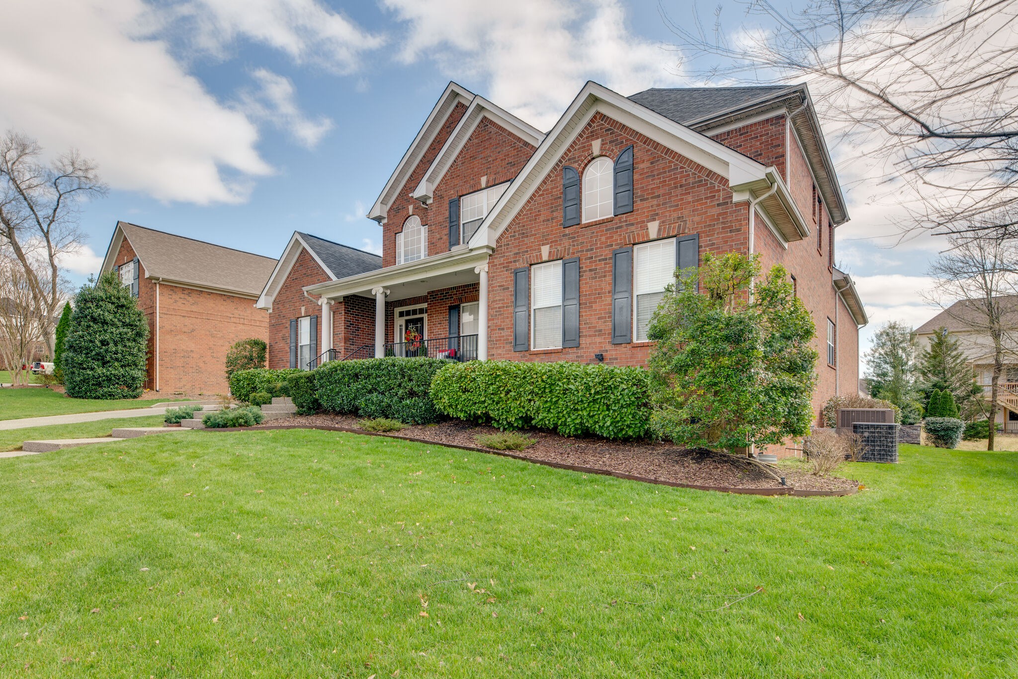 1215 White Rock Road Spring Hill, TN 37174 - Photo 2 of 42 a front view of a house with a yard