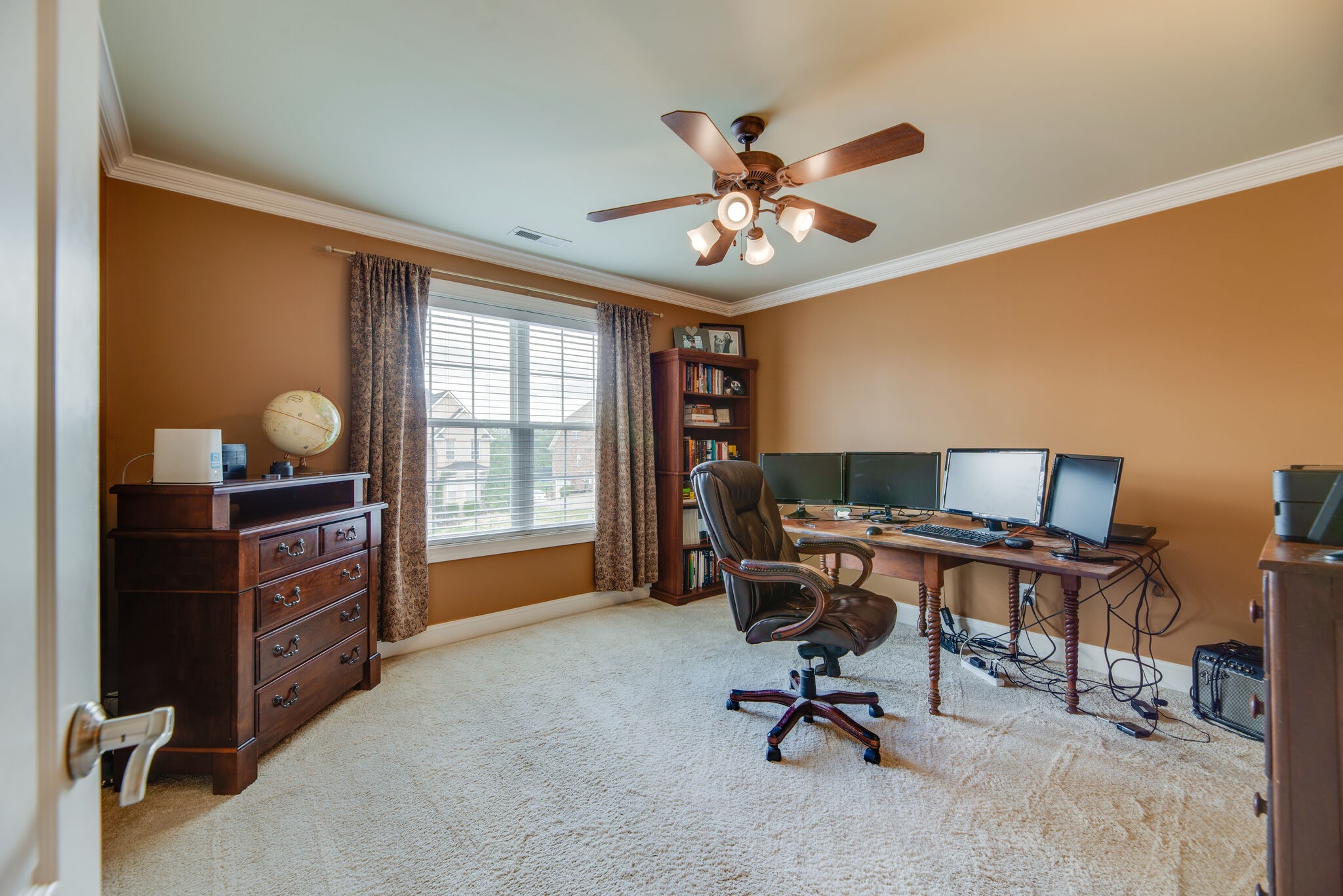 1215 White Rock Road Spring Hill, TN 37174 - Photo 27 of 42 a view of a workspace with furniture and a window