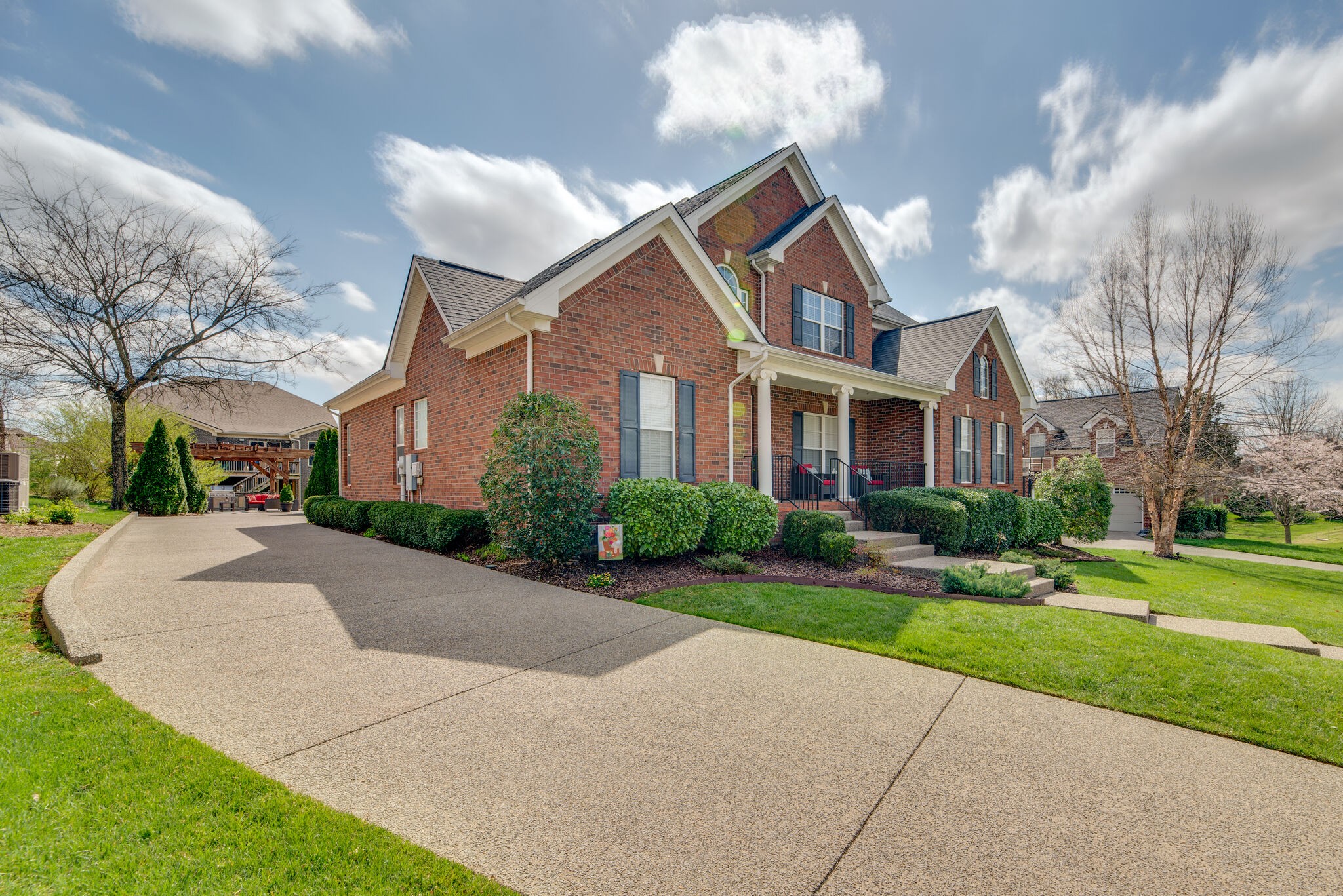 1215 White Rock Road Spring Hill, TN 37174 - Photo 3 of 42 a front view of a house with a yard and garage