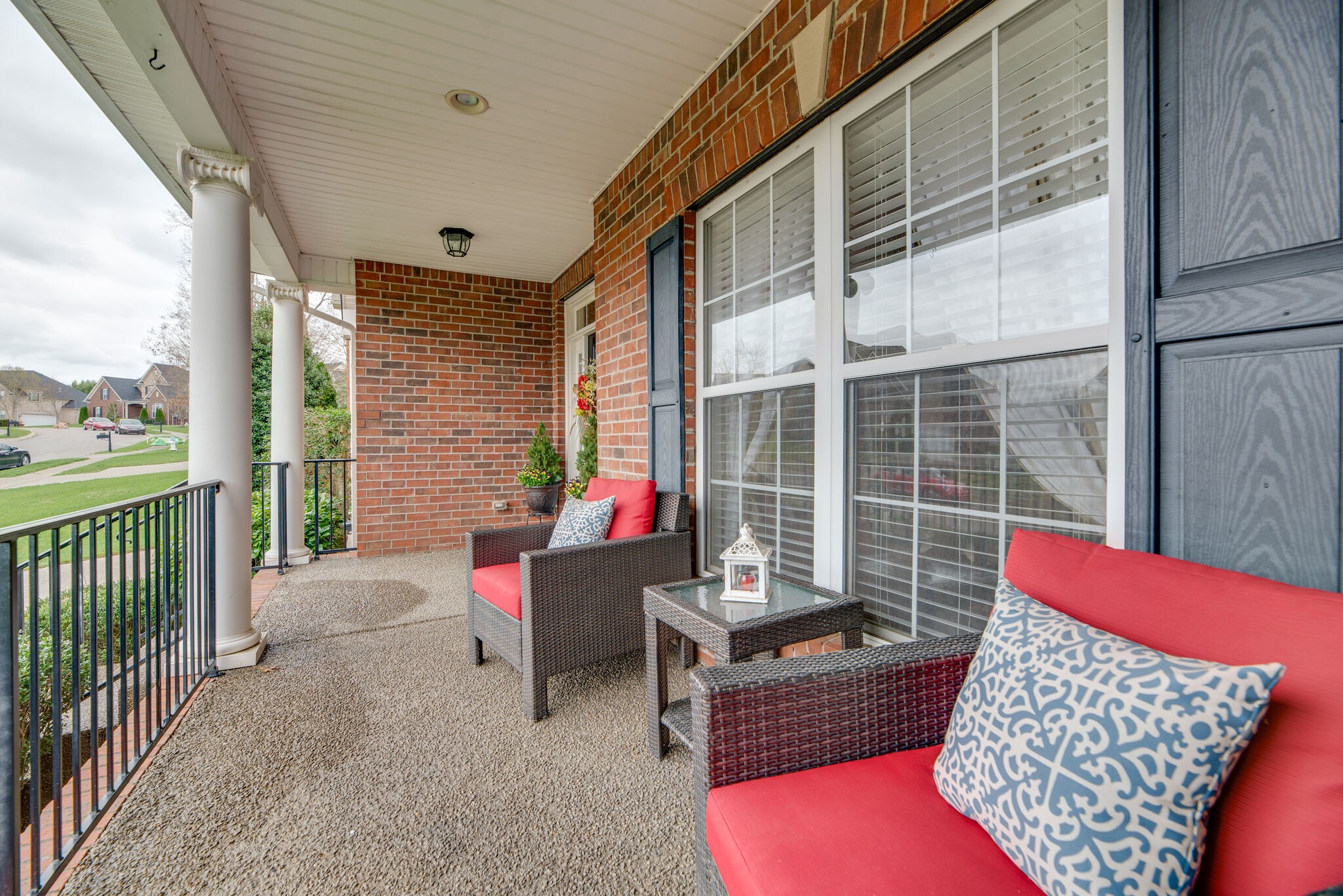 1215 White Rock Road Spring Hill, TN 37174 - Photo 5 of 42 a outdoor living space with patio furniture and a potted plant