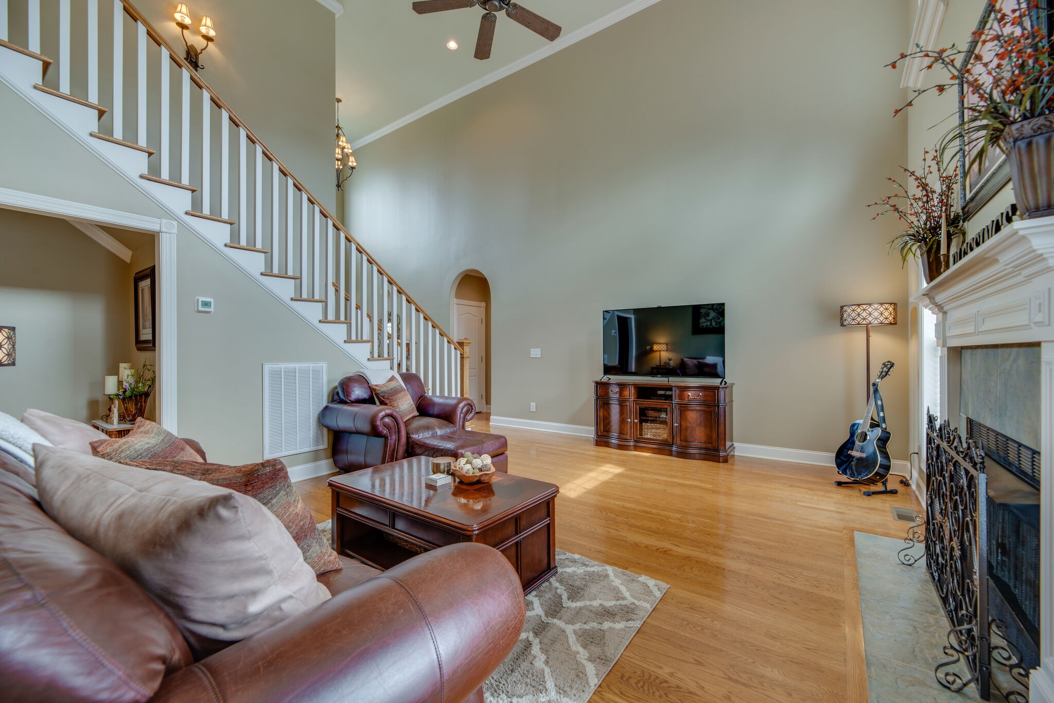 1215 White Rock Road Spring Hill, TN 37174 - Photo 9 of 42 a living room with furniture and a flat screen tv
