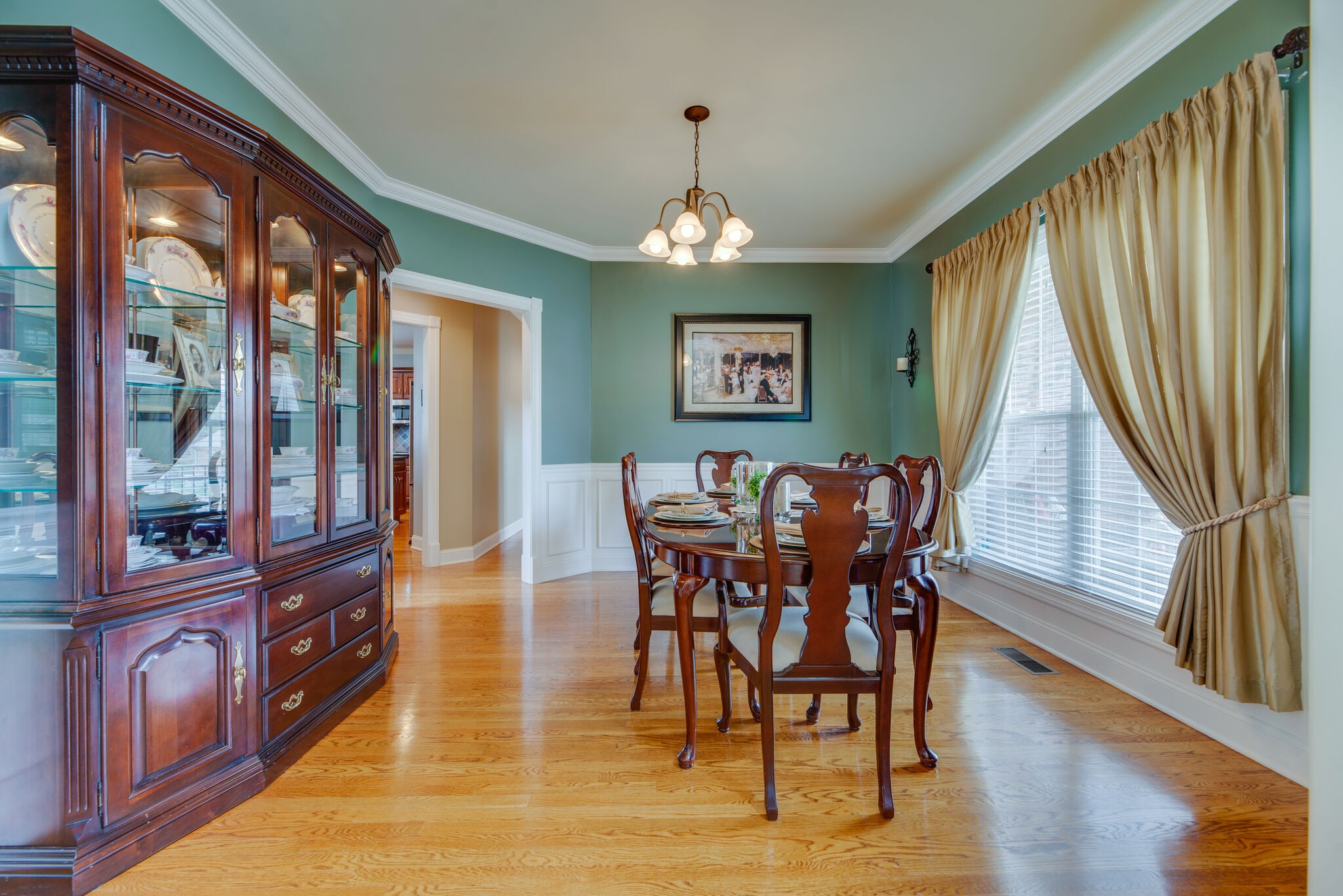 1215 White Rock Road Spring Hill, TN 37174 - Photo 10 of 42 a view of a dining room with furniture window and wooden floor