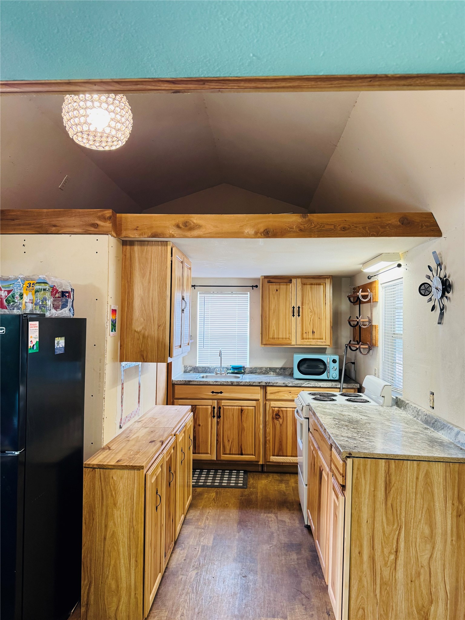 2071 Camp Seale Road Livingston, TX 77351 - Photo 15 of 28 a kitchen with stainless steel appliances granite countertop a sink stove and refrigerator