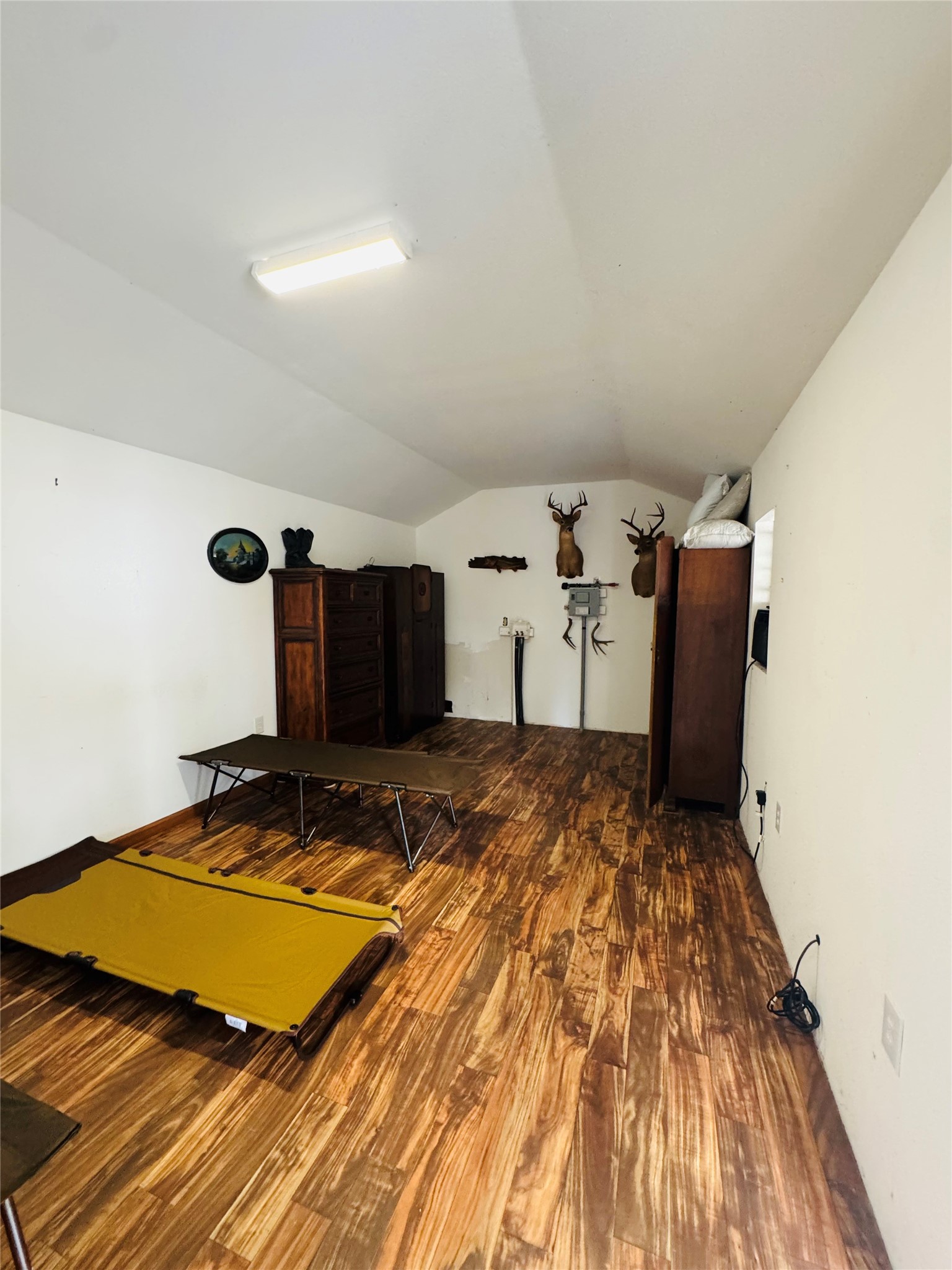 2071 Camp Seale Road Livingston, TX 77351 - Photo 18 of 28 a bedroom with a bed and a table