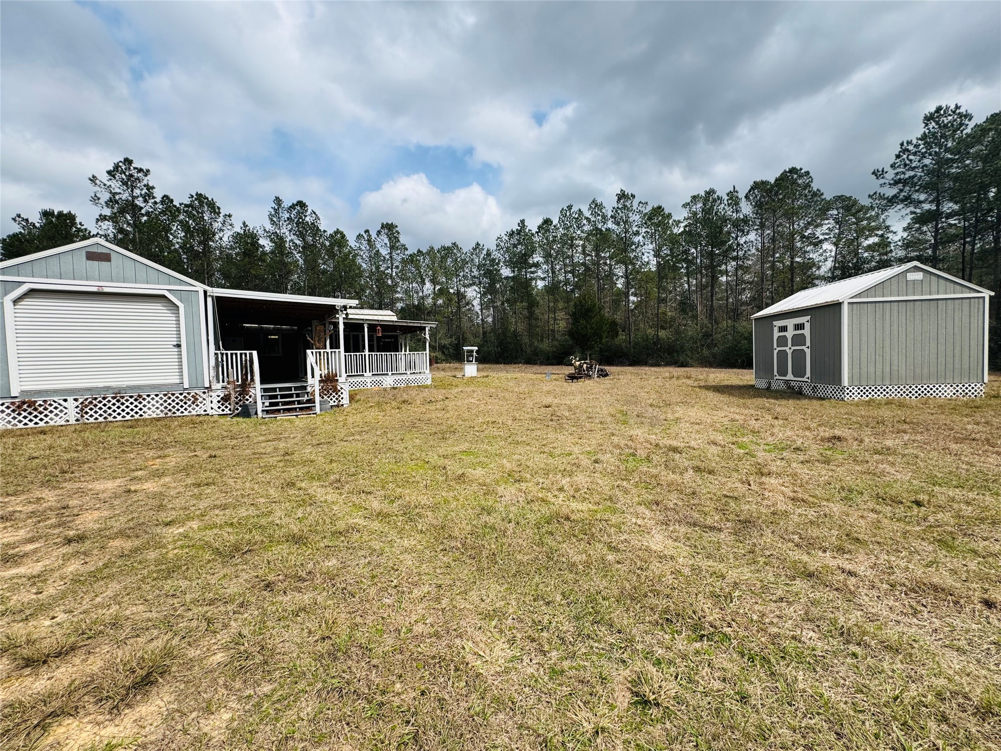 2071 Camp Seale Road Livingston, TX 77351 - Photo 3 of 28 a view of a house with a outdoor space