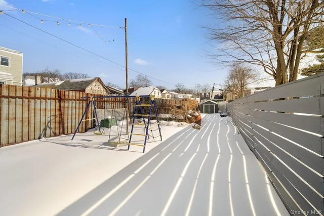 a view of a balcony with chairs