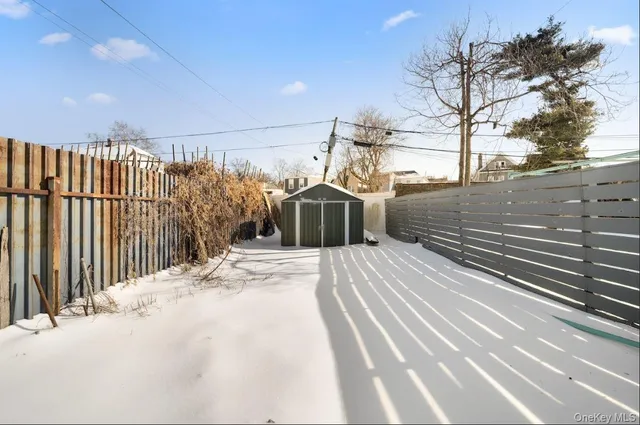 a view of a house with a street