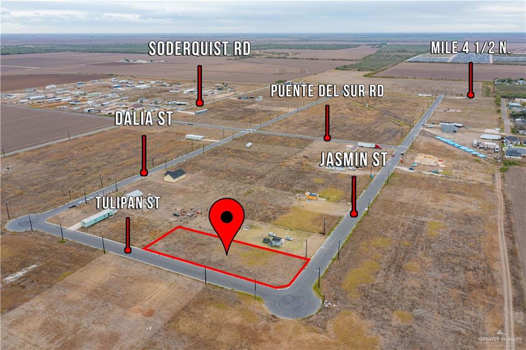 2909 Yasmin Street Donna, TX 78537 - Photo 4 of 7 a view of a street with parking