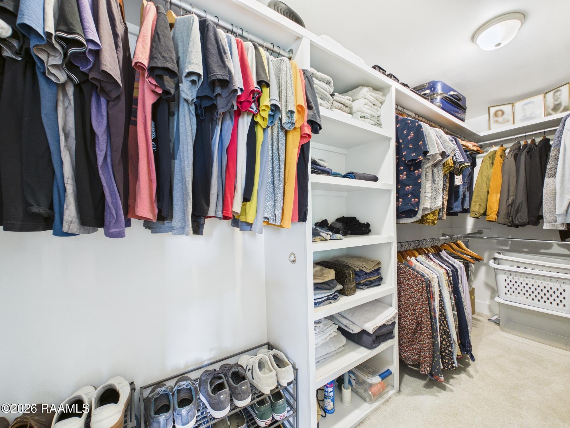 1201 South College Road, Unit 22 Lafayette, LA 70503 - Photo 24 of 41 Primary Walk-In Closet