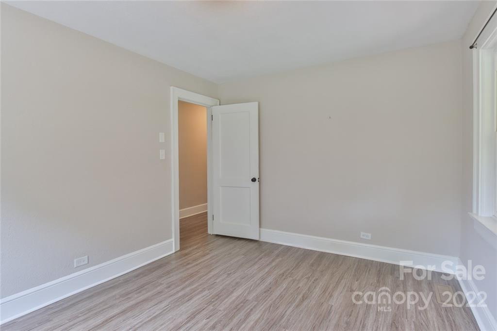 263 McCrary Place Lenoir, NC 28645 - Photo 18 of 40 a view of an empty room with wooden floor