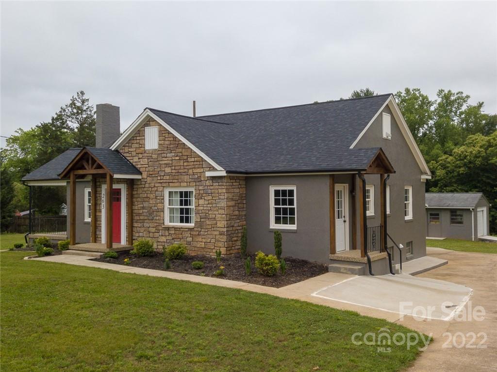 263 McCrary Place Lenoir, NC 28645 - Photo 22 of 40 a front view of a house with a yard
